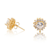 Load image into Gallery viewer, A beautiful tribute to the heart. Delicate 18ct yellow gold plated studs with clear cubic zirconia stones framing a subtle heart at the centre. Side view (butterfly and pole closure))
