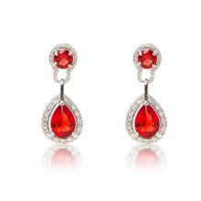 Load image into Gallery viewer, Dazzling rhodium plated earrings with centre stones of red cubic zirconia framed by clear cubic zirconia stones.
