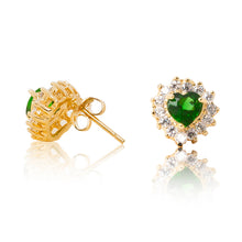 Load image into Gallery viewer, A beautiful tribute to the heart. Delicate 18ct yellow gold plated studs with cubic zirconia stones framing a subtle green heart at the centre. Side view (Butterfly and pole side closure)
