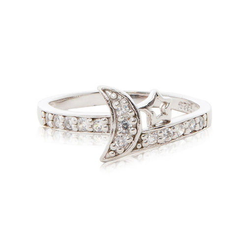 A charming 925 sterling silver moon and star ring encrusted in brilliant cut cubic zirconia stones and diamond-look shoulders.