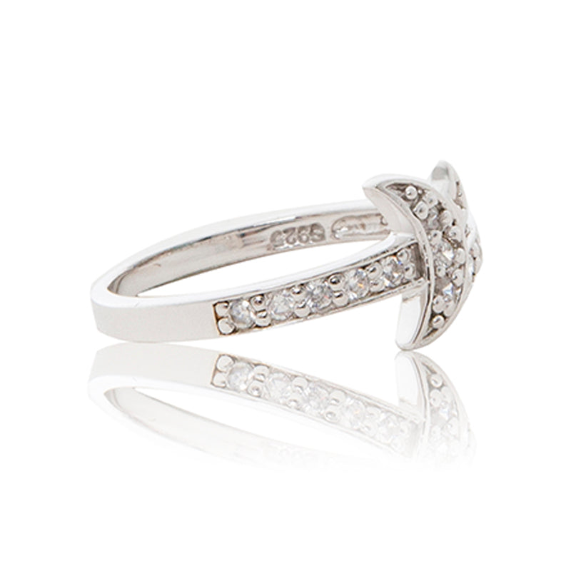 A charming 925 sterling silver moon and star ring encrusted in brilliant cut cubic zirconia stones and diamond-look shoulders. Side view half eternity