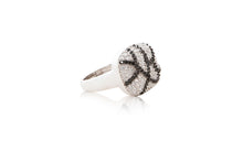 Load image into Gallery viewer, A 925 sterling silver contemporary cocktail ring, beautifully encrusted with a crackle effect of black and clear brilliant cubic zirconia stones. Side view of band
