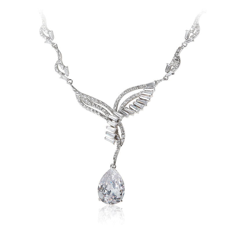 A beautiful statement platinum finished pear drop earrings and necklace set. Evening necklace
