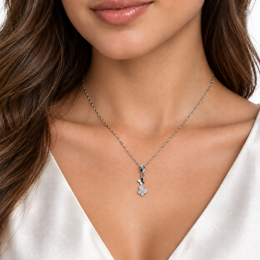 Araminta silver butterfly necklace worn by a model
