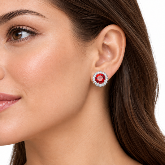 Una red rhodium plated stud earring worn on a model