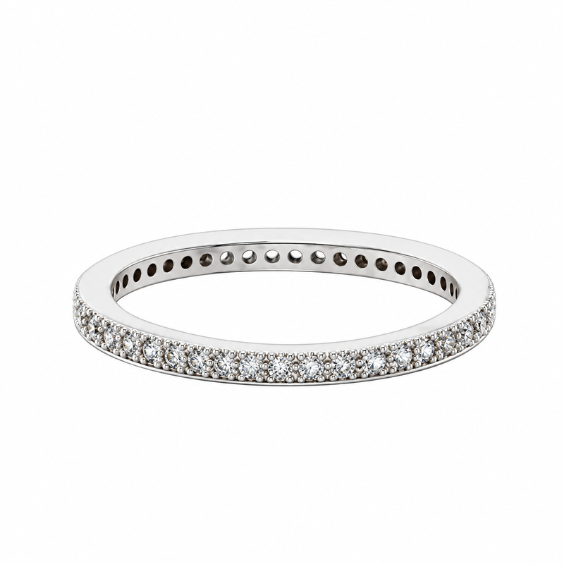 Esme rhodium plated eternity ring with a single row of cubic zirconia on white