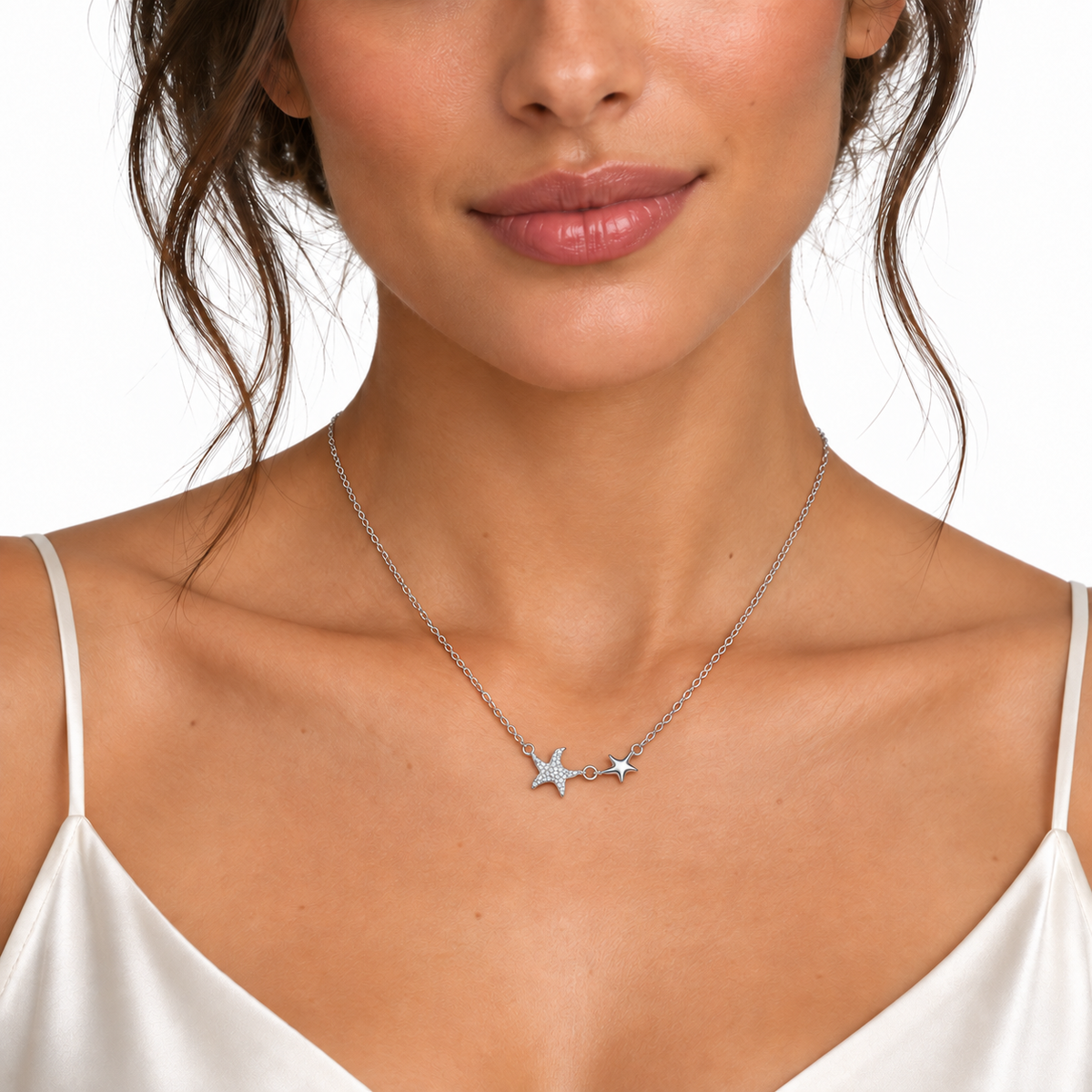 Ines sterling silver starfish necklace worn on a model