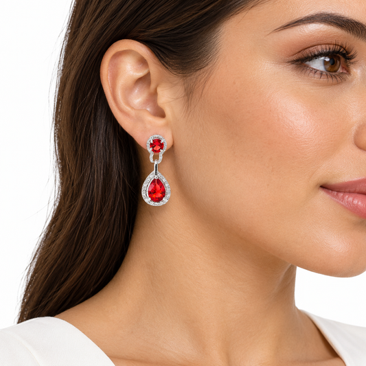 Mae red and silver drop earring worn by a model