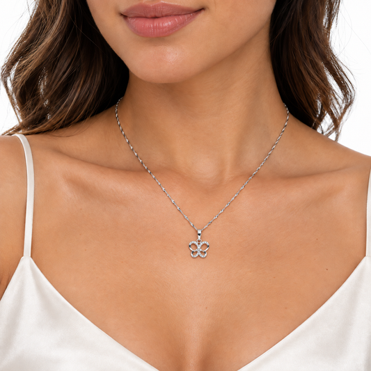 Taylor sterling silver butterfly necklace worn on a model