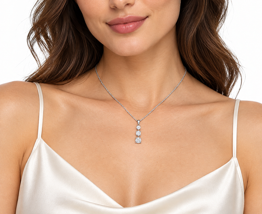 Treta sterling silver three stone necklace worn on a model