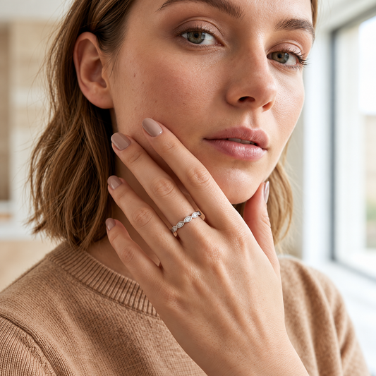 Model wearing the delicate Bryn rhodium plated ring