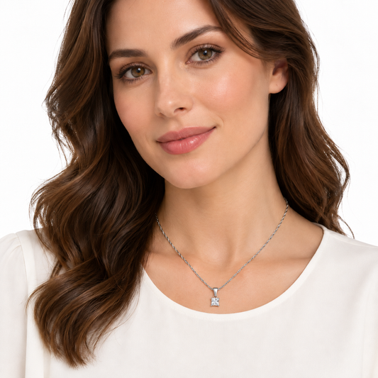 Model wearing Jasmine princess cut silver solitaire necklace