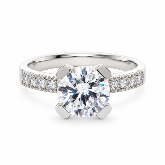 Marla sterling silver solitaire ring with flat claws and stone set shoulders, front view