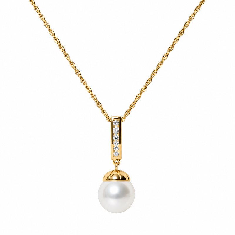 Roma gold necklace with a cubic zirconia bar and white faux pearl drop on a fine twisted chain, photographed against a white background.