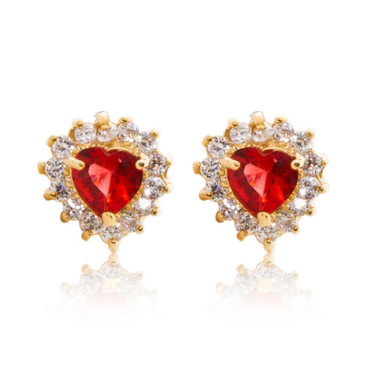 A beautiful tribute to the heart. Delicate 18ct yellow gold plated studs with clear cubic zirconia stones framing a subtle red heart at the centre.