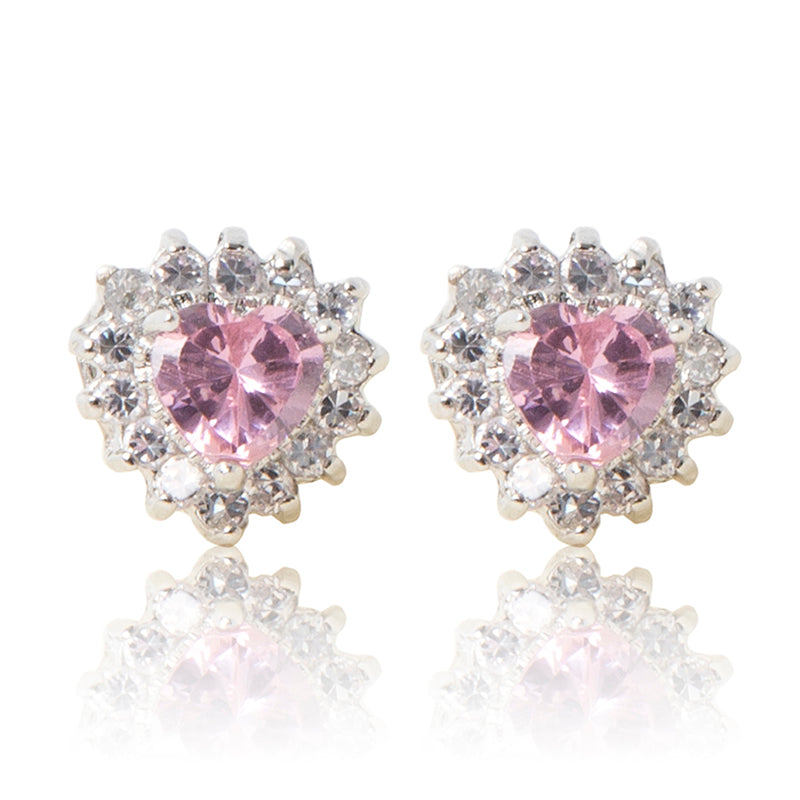A beautiful tribute to the heart. Delicate rhodium plated studs with clear cubic zirconia stones framing a subtle pink heart stone at the centre. For pierced ears. 