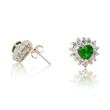Load image into Gallery viewer, A beautiful tribute to the heart. Delicate rhodium plated studs with clear cubic zirconia stones framing a subtle green heart stone at the centre. For pierced ears. Side view (Butterfly and pole closure)
