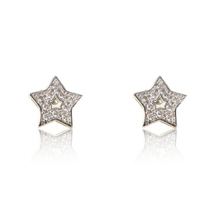 A pair of rhodium plated celestial star stud earrings set with cubic zirconia and a star centre cut out. For pierced ears.