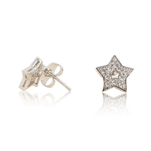 Load image into Gallery viewer, A pair of rhodium plated celestial star stud earrings set with cubic zirconia and a star centre cut out. For pierced ears. Side view (Butterfly and pole closure)
