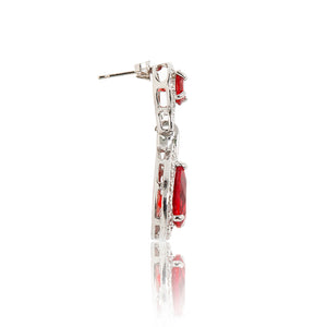 Dazzling rhodium plated earrings with centre stones of red cubic zirconia framed by clear cubic zirconia stones. Side view (Butterfly and pole closure)