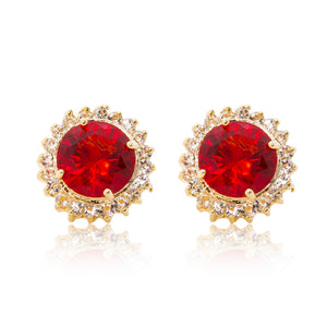 Delicate 18ct yellow gold plated plated studs with a red centre surrounded by a halo of cubic zirconia stones. For pierced ears.