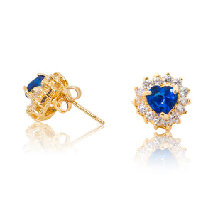 A beautiful tribute to the heart. Delicate 18ct yellow gold plated studs with clear cubic zirconia stones framing a subtle blue heart at the centre. Side view (Butterfly and pole closure)