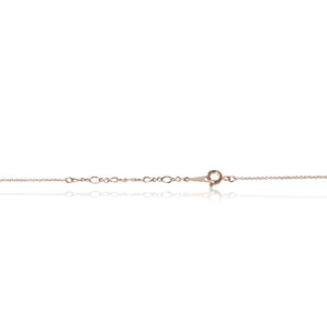 A dainty 18ct yellow gold plated cubic zirconia encrusted elephant pendant and chain trigger clasp chain fastening