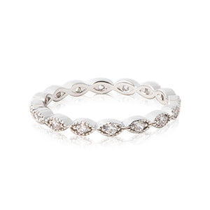 Rhodium plated band decorated with beaded oval shapes framing round brilliant CZ stones.