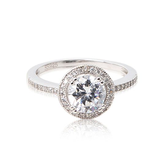 The half eternity halo band. A glamorous round brilliant cut cubic zirconia ring set in 925 sterling silver with a halo of bead-set cubic zirconia stones. Front view