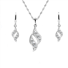 Load image into Gallery viewer, A 925 sterling silver twist like pendant and earrings set. For pierced ears.
